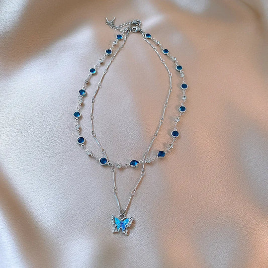 Collier papillon coréen pour femme, cristal bleu